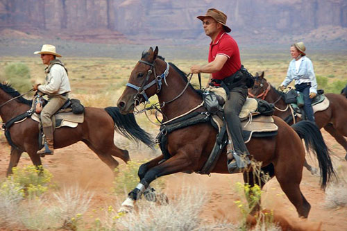on horseback through the Monument Valley 