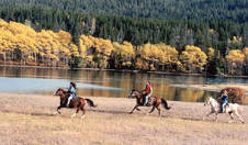 Cantering the horses along the Chilko River