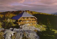 Purcell Mountain Lodge perched in a glorious sunset