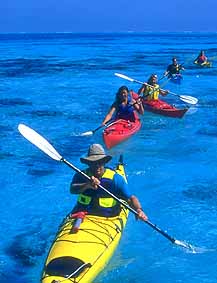 Kayaking off Long Ceye, Belize.